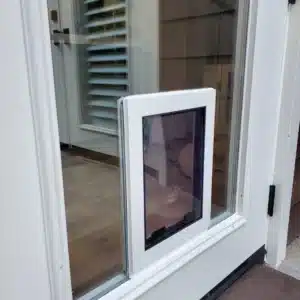 Custom sized pet door for glass